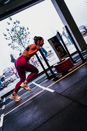 Athlete competing in a HYROX simulation