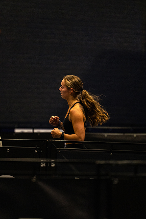 Athlete competing in a HYROX simulation