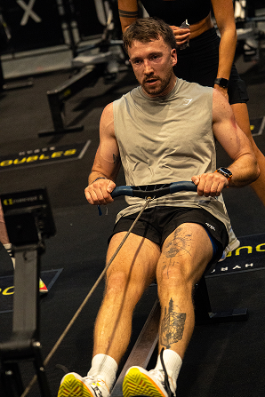 Athlete competing in a HYROX simulation