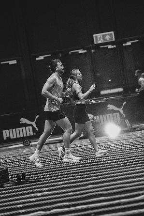 Athlete competing in a HYROX simulation