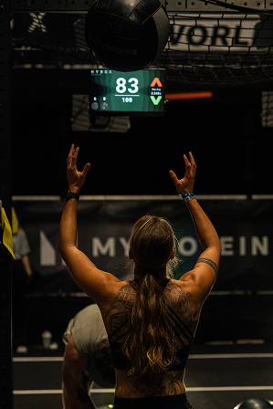 Athlete competing in a HYROX simulation