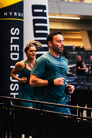 Athlete competing in a HYROX simulation